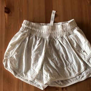 White Lululemon running shorts